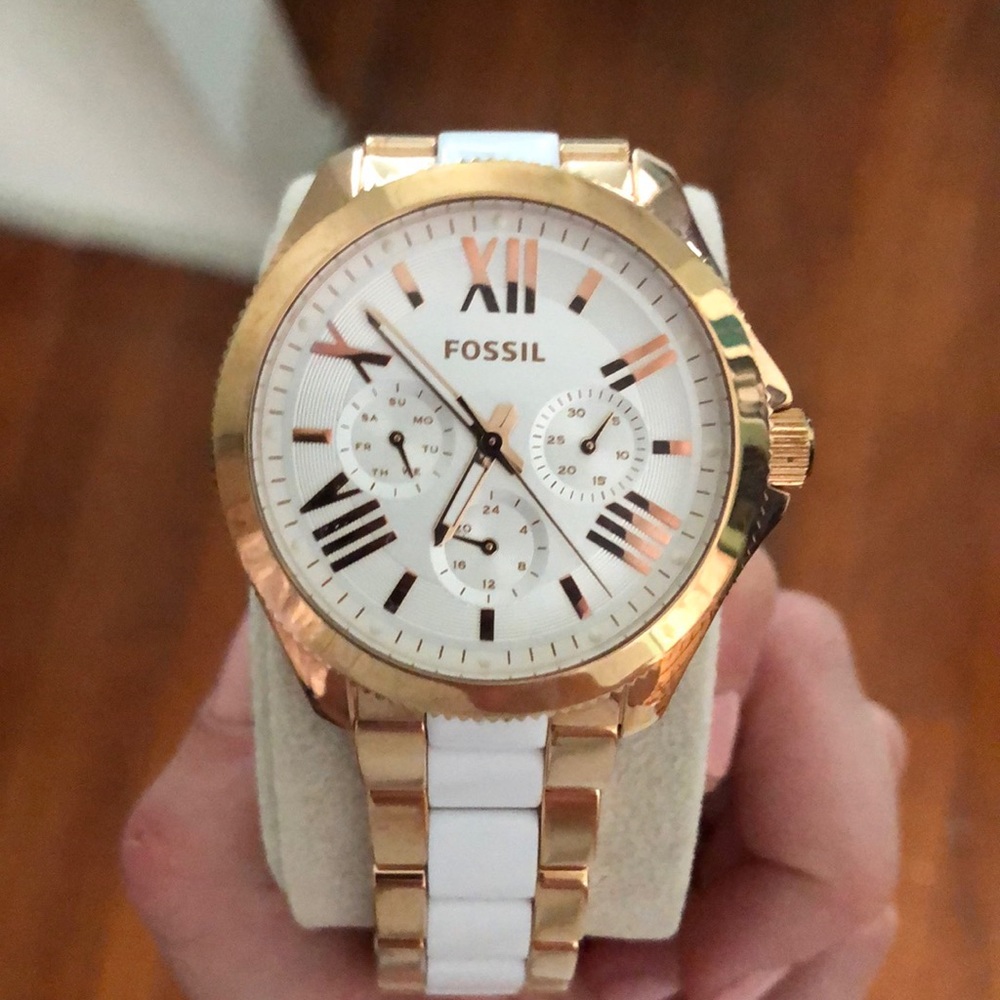 Fossil rose gold and white watch.